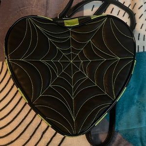 love pain and stitches
 hearts backpack